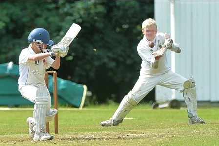 A school wicket keeper (not me!) 